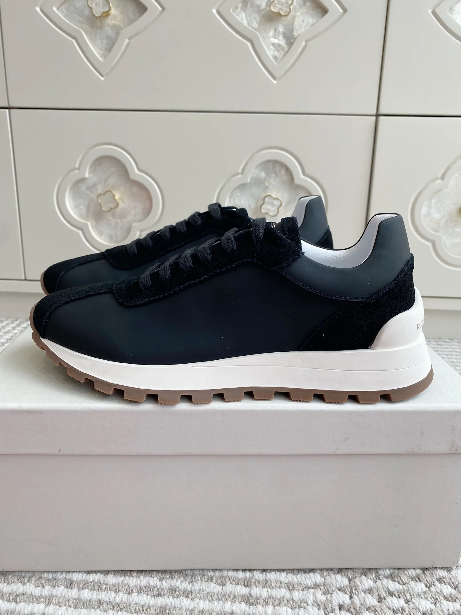 Brunello Cucinelli Black Leather and Suede Sneakers – Timeless Luxury Craftsmanship